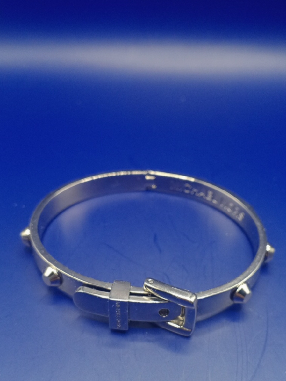 Michael Kors Silver Tone Buckle & Stud Bangle Bracelet